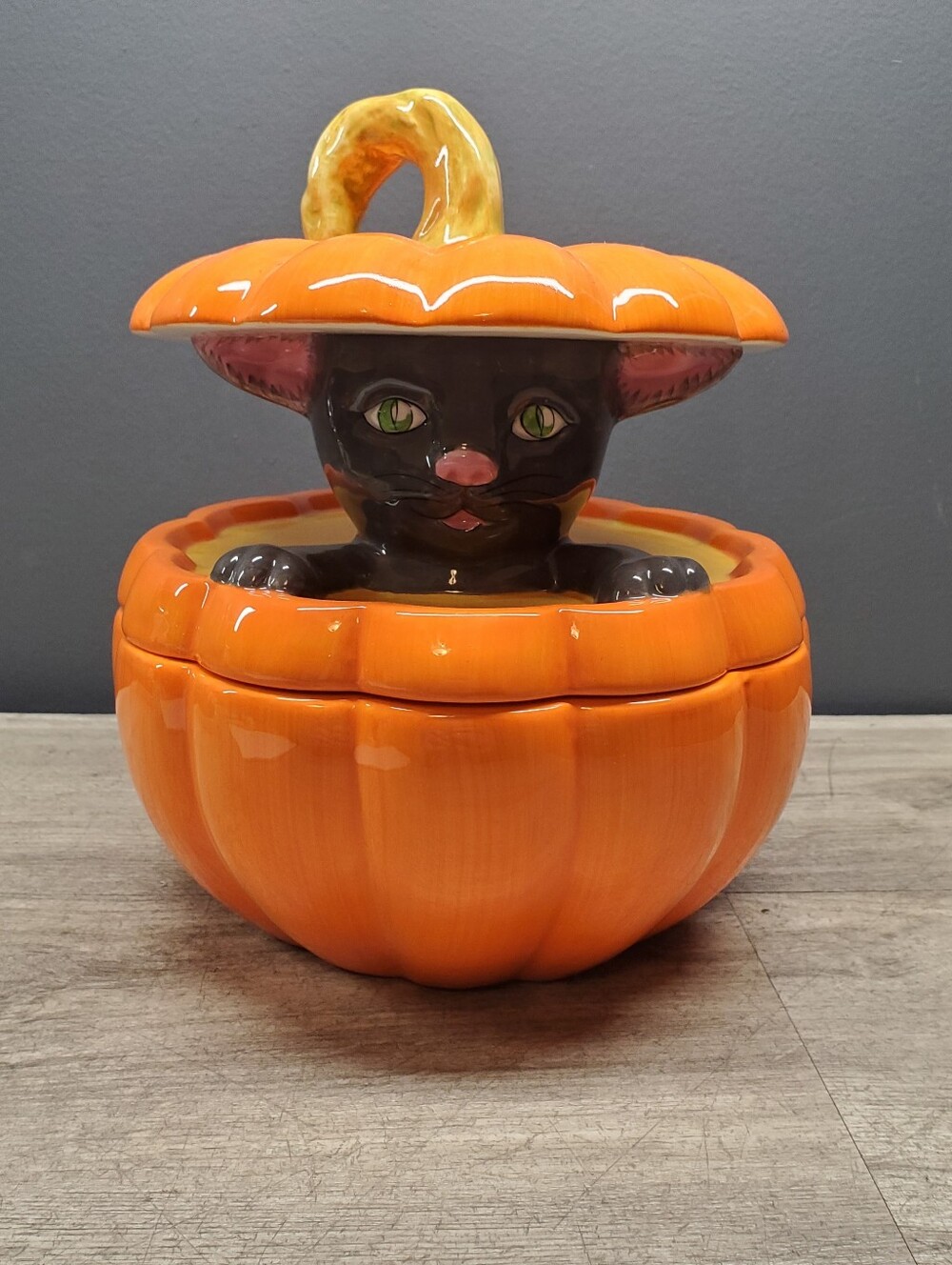 Vintage ceramic treat jar with cat in pumpkin